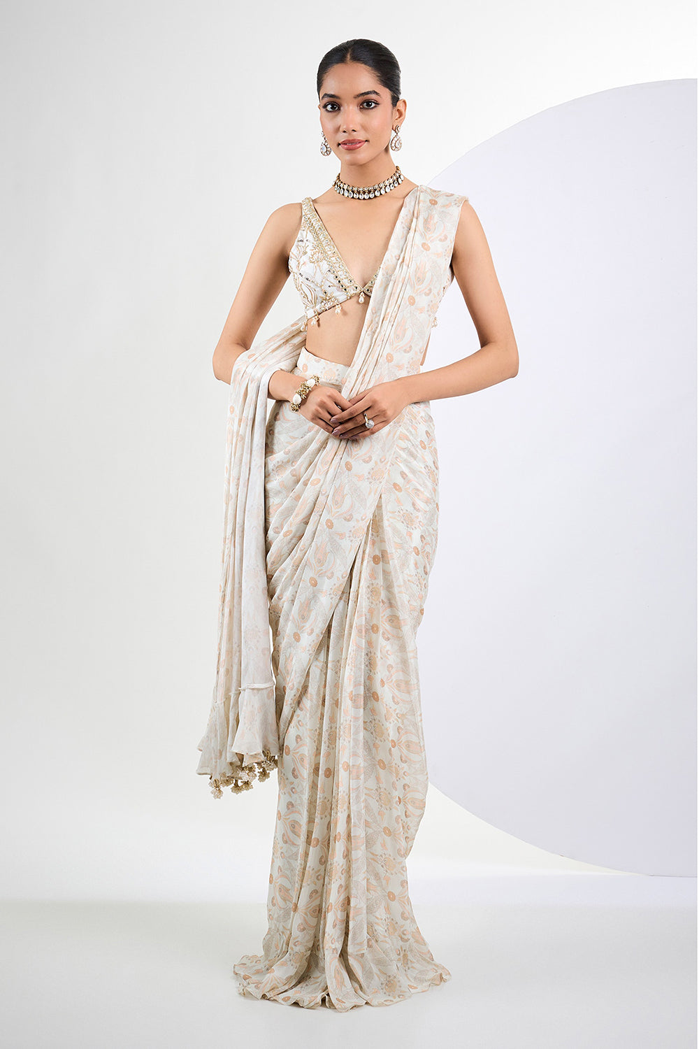 Printed chinon chiffon ivory pre draped saree with pearl tassels