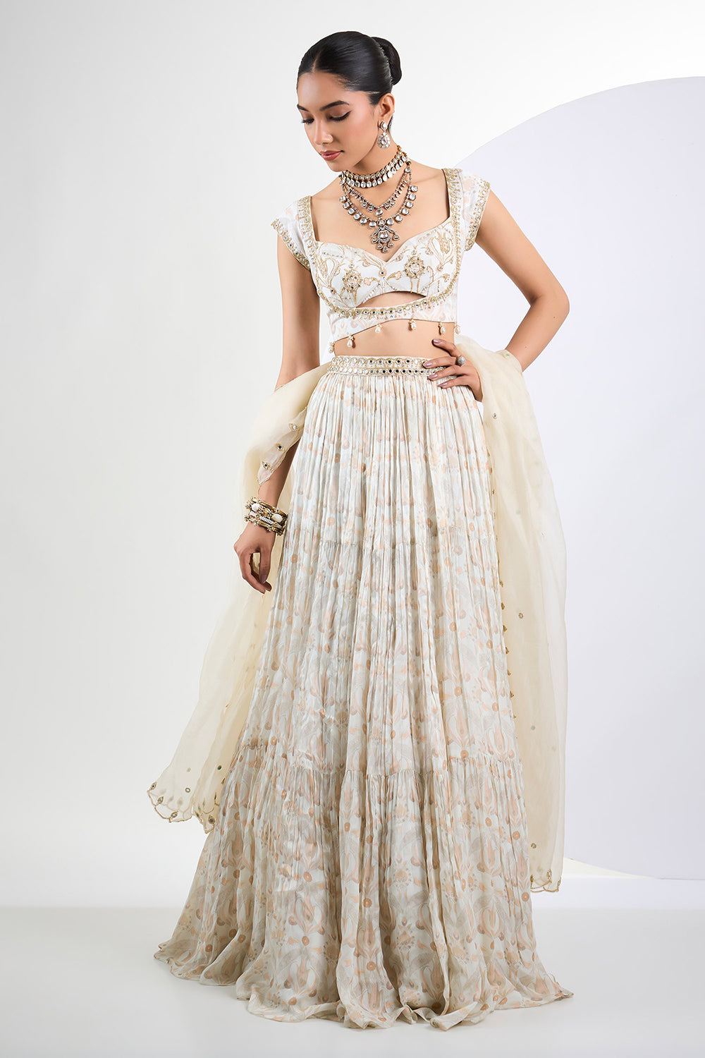 Printed chinon chiffon ivory lehenga set with pearl tassels and organza Dupatta