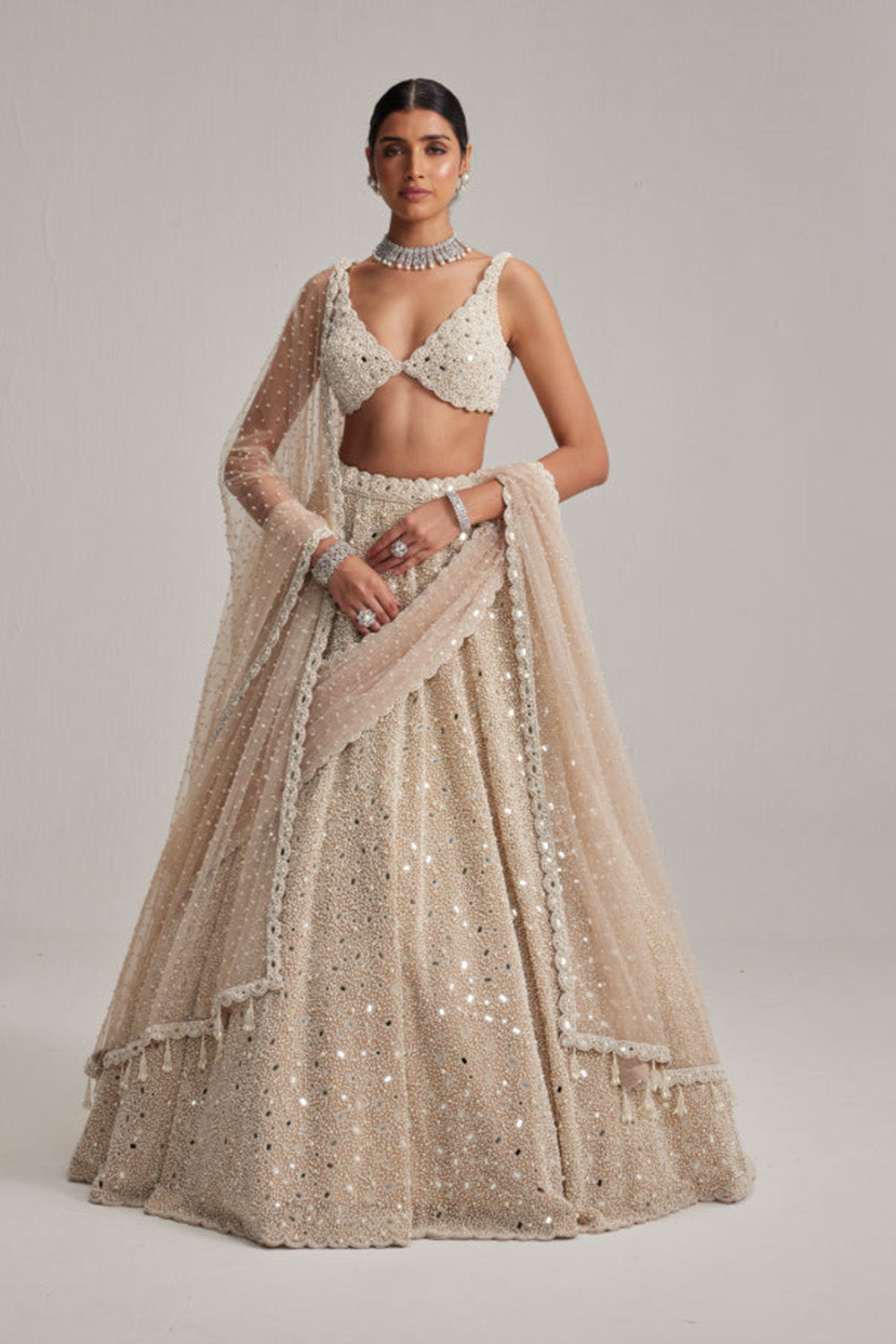 Light Beige Dense mirror and pearl lehenga set with Double Dupatta and Veil