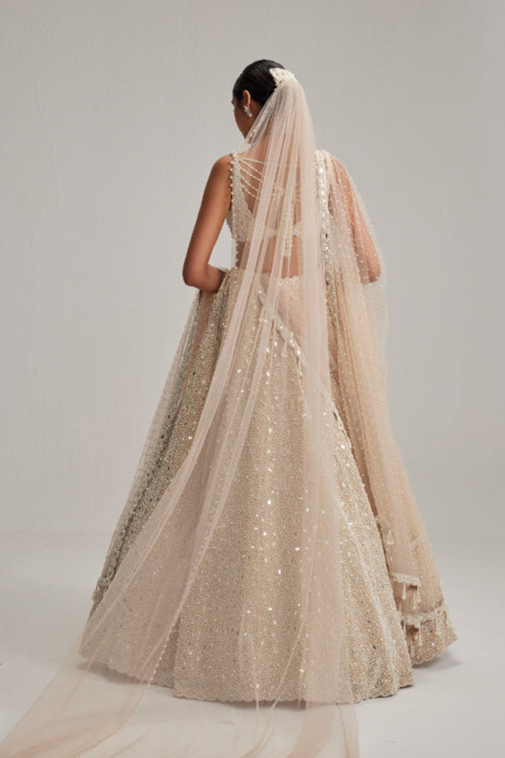 Light Beige Dense mirror and pearl lehenga set with Double Dupatta and Veil