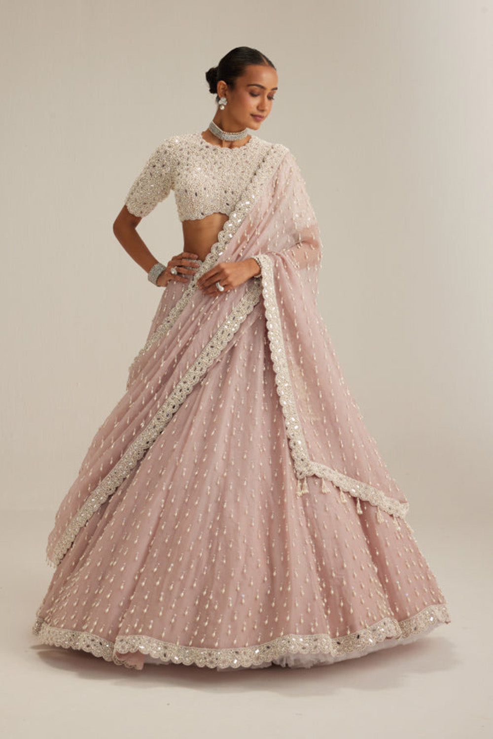 Ash Pink Pearl Drop Lehenga with high neck blouse