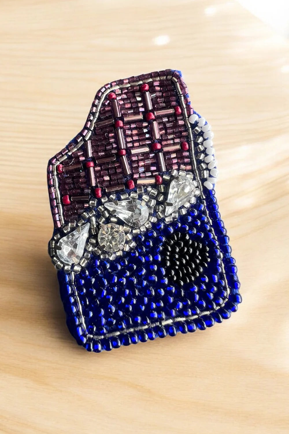 CADBURY CLIP AND BROOCH