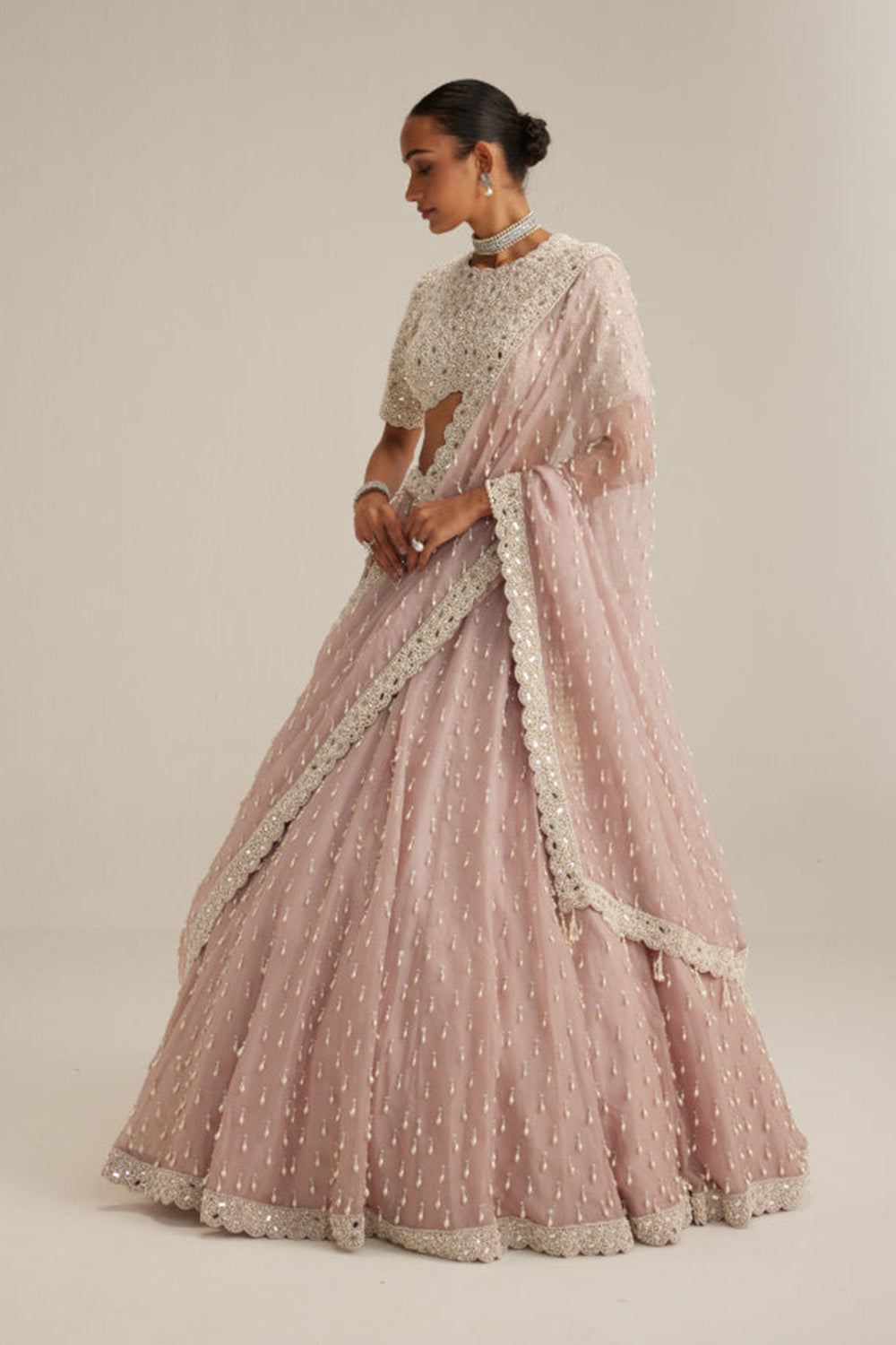Ash Pink Pearl Drop Lehenga with high neck blouse