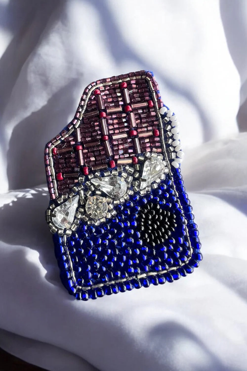 CADBURY CLIP AND BROOCH