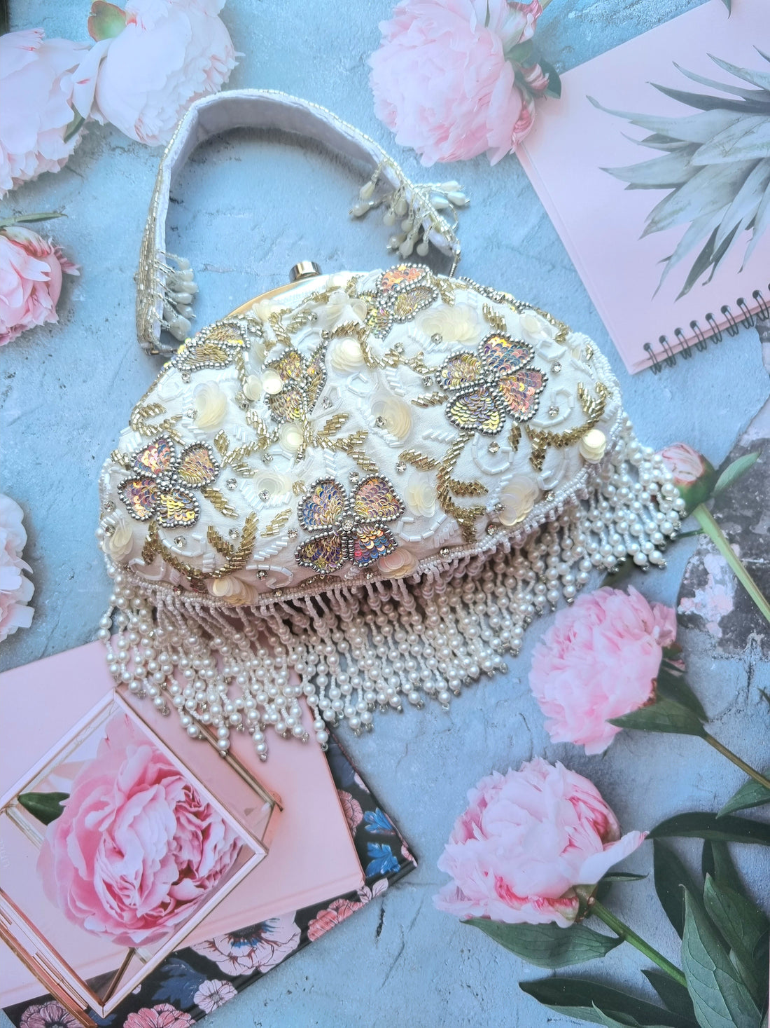 CY A Clutch Story Belle Fluer Tassel Hand Embroidered Clutch Front 1