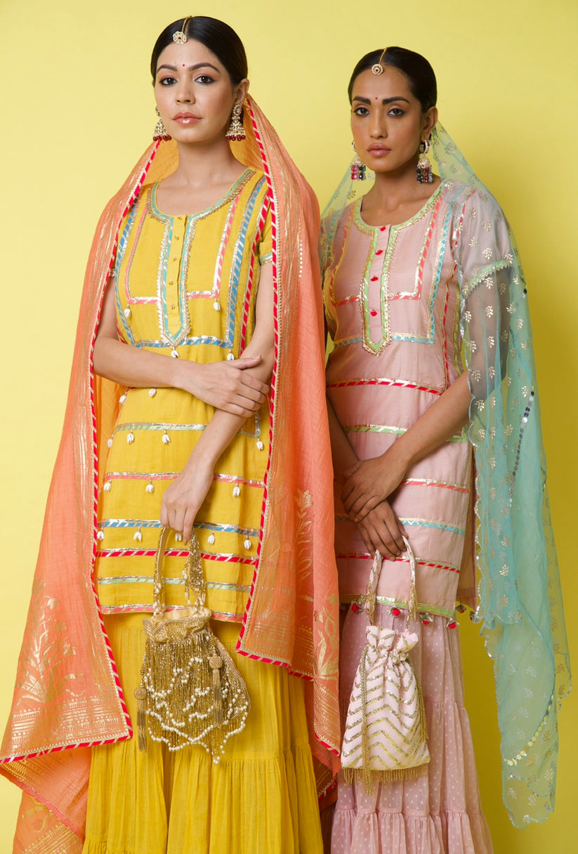 CY A Clutch Story Gold Fringe Glam Potli