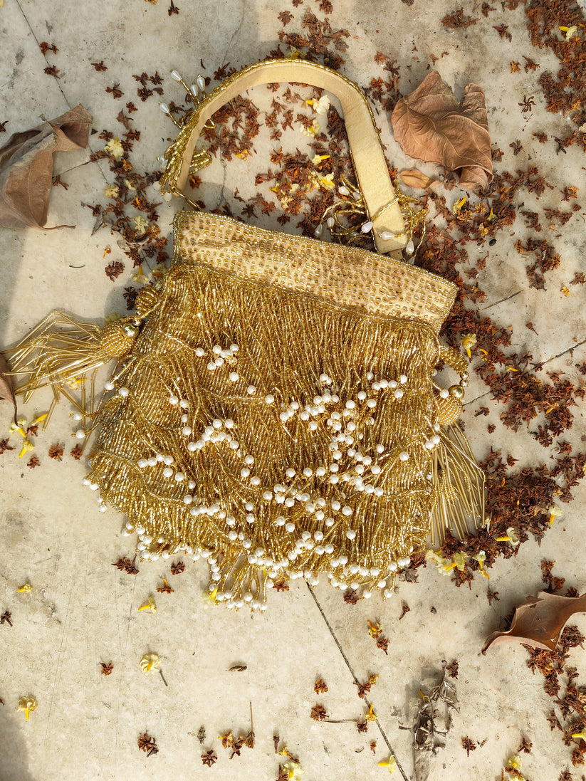 CY A Clutch Story Gold Fringe Glam Potli Front 1