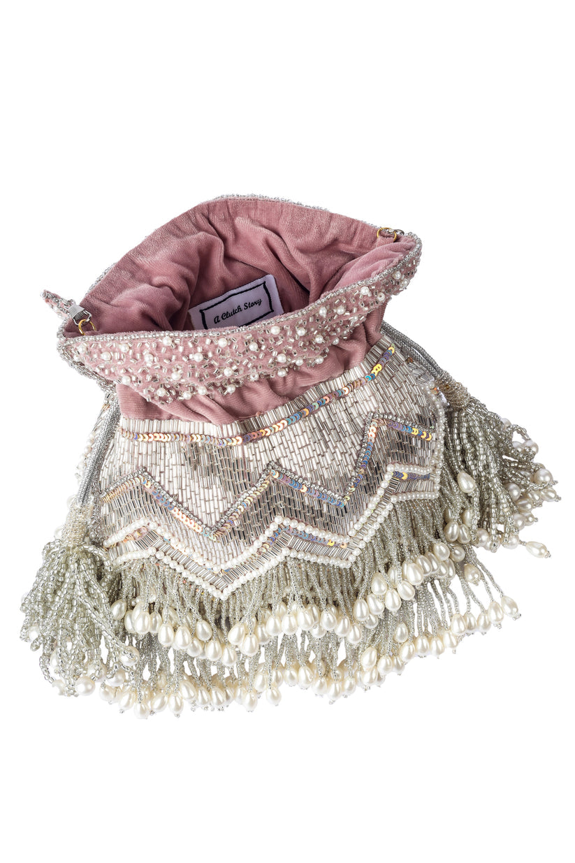 CY A Clutch Story Peri Pearl Tassel Hand Embroidered Potli Closeup 2