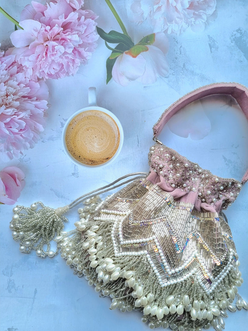 CY A Clutch Story Peri Pearl Tassel Hand Embroidered Potli Front 2