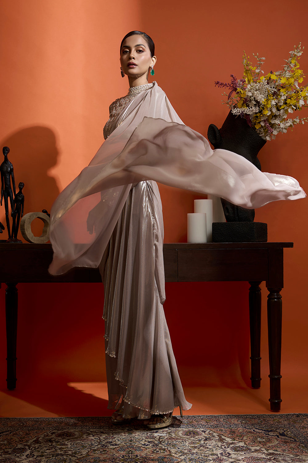 Champagne Gold Drape Saree Coupled with a Beaded Blouse