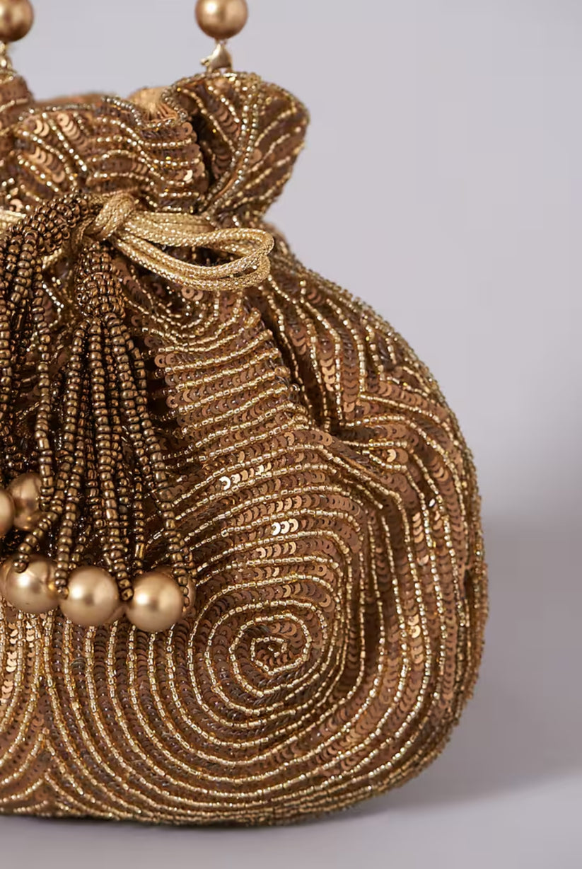 CY A Clutch Story Antique Gold Matka Potli Closeup 1