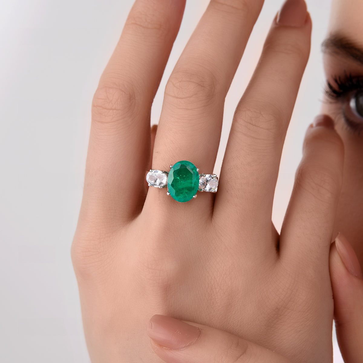 CY Diosa Paris Man-Made Oval Cut Emerald And White Swarovski Zirconia Ring Front 1