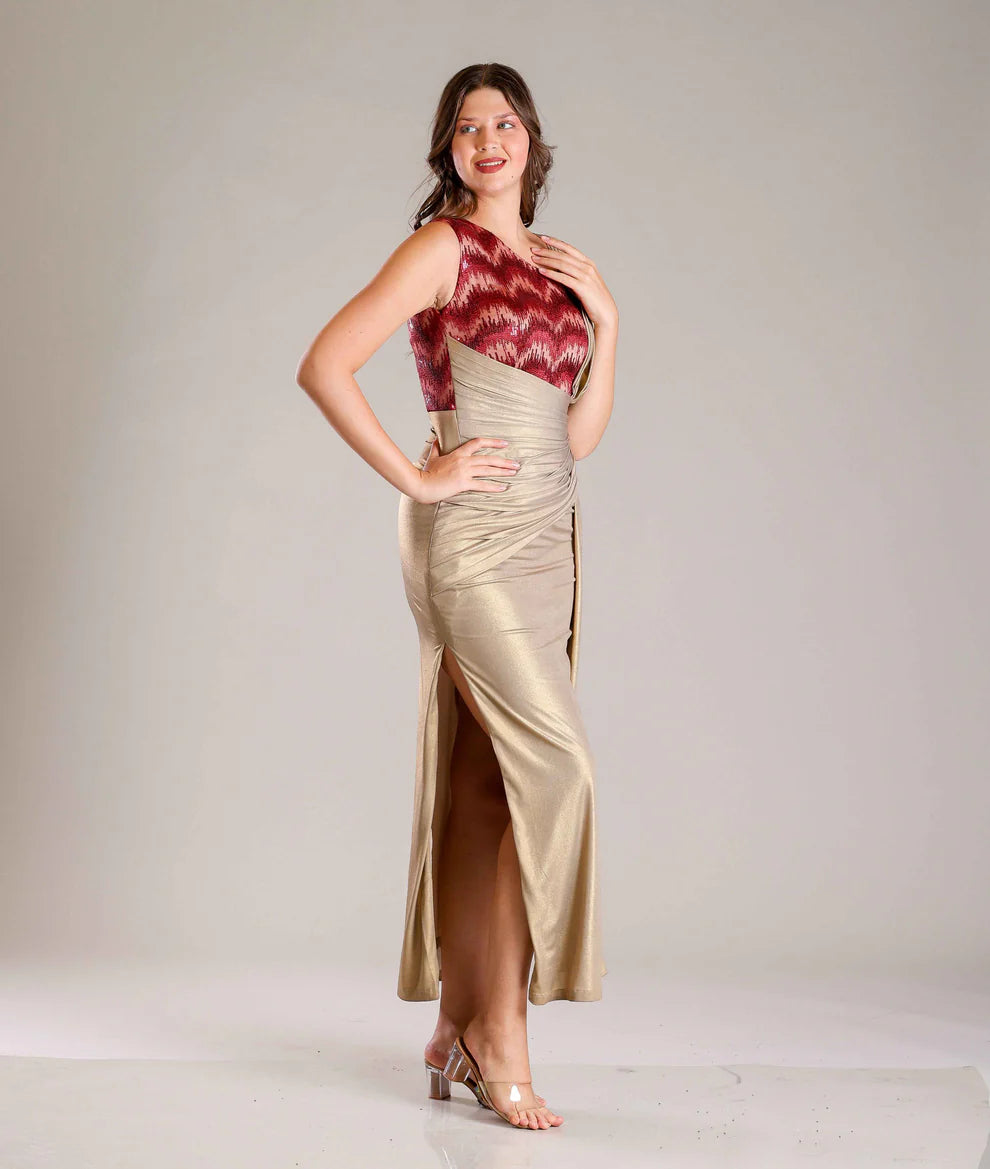 Gold Shimmer Lycra Gown & Pleated Belt With Maroon Sequins Highlighting On Bodice