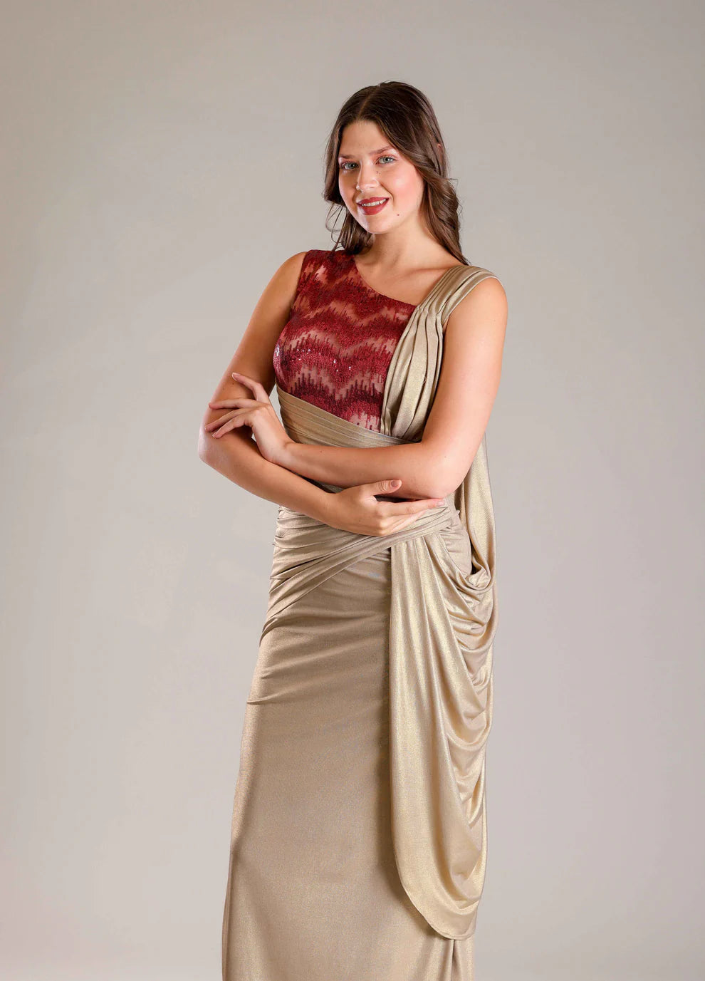 Gold Shimmer Lycra Gown & Pleated Belt With Maroon Sequins Highlighting On Bodice