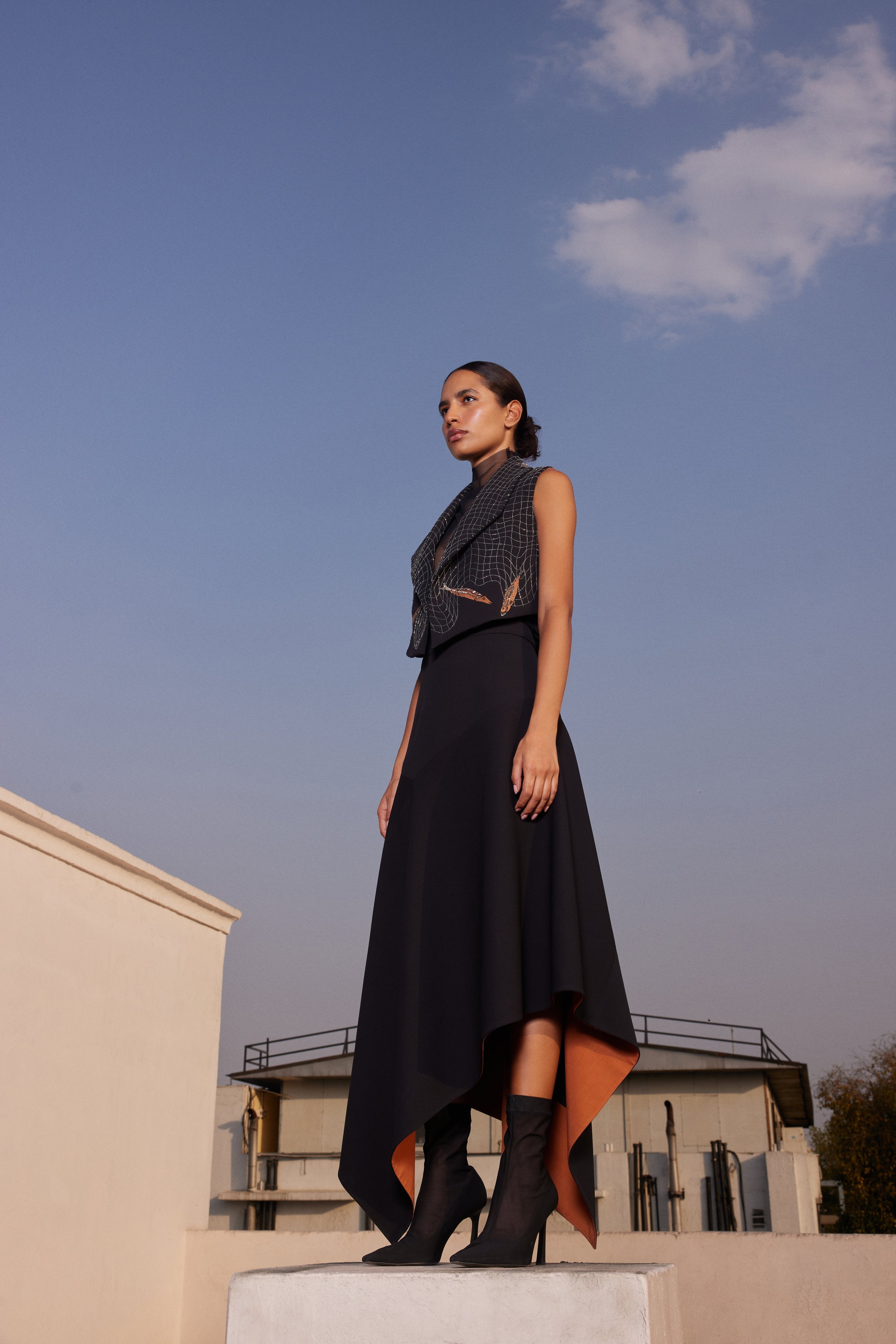 ASYMMETRIC SKIRT OF ( FISH IN THE NET' CROPED SLEEVELESS JACKET)