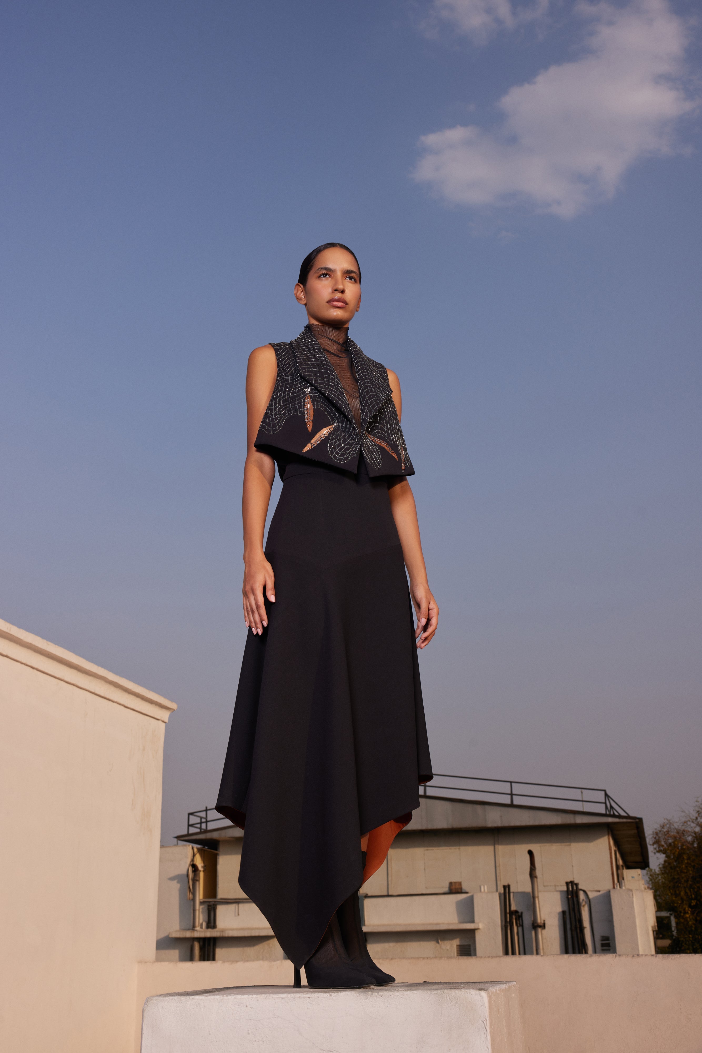 ASYMMETRIC SKIRT OF ( FISH IN THE NET' CROPED SLEEVELESS JACKET)