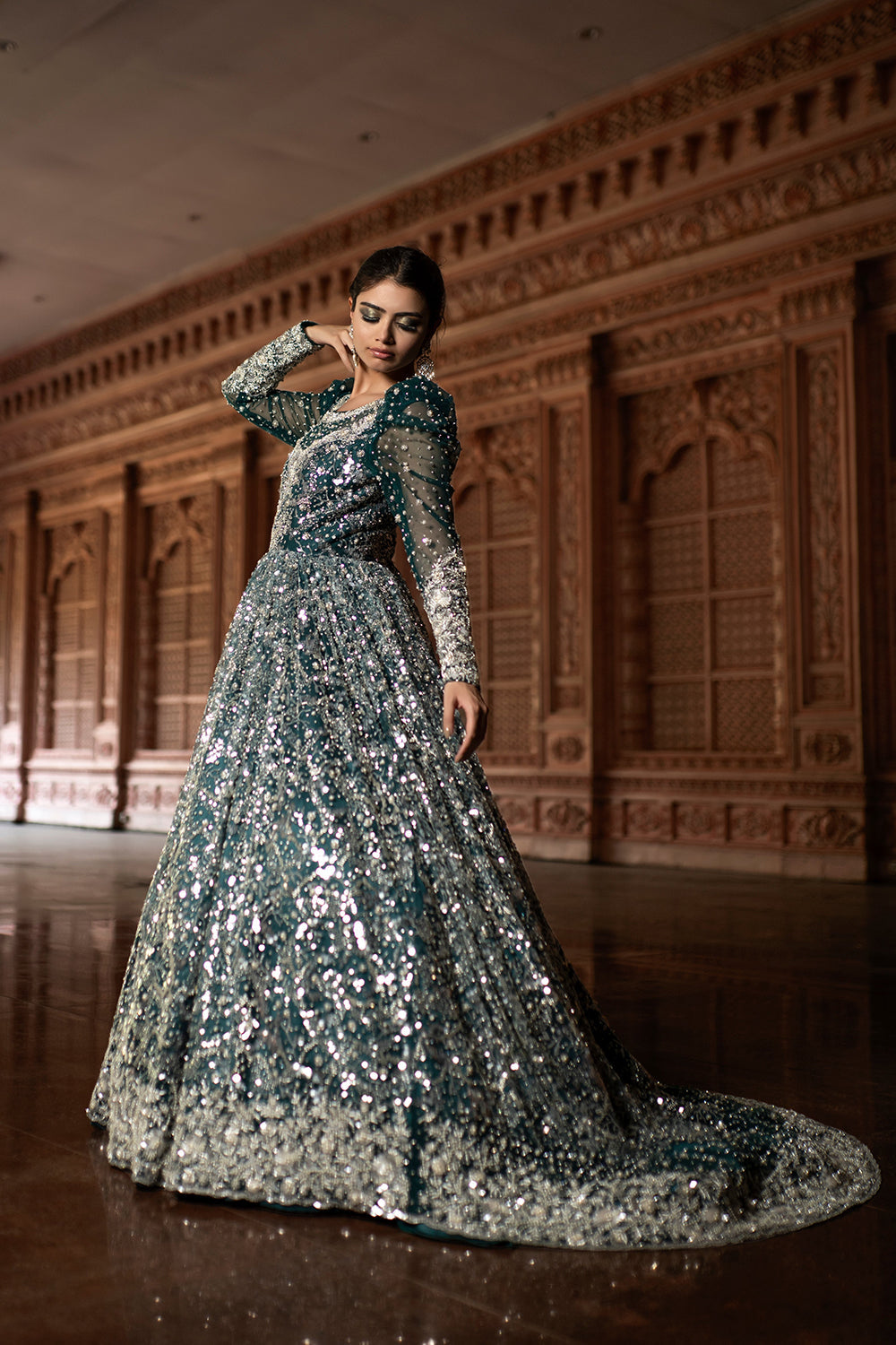 Emerald Green Sequin Trail Gown.