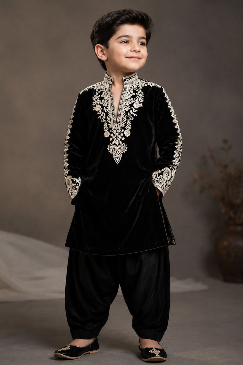 Black Velvet Kurta Set Featuring Inticate Golden Embroidery Paired With Classic Salwar