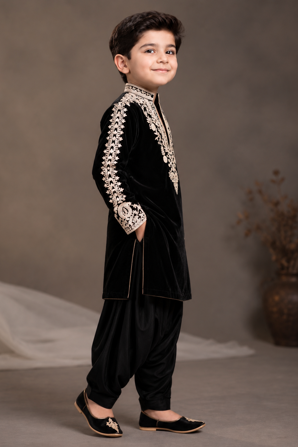 Black Velvet Kurta Set Featuring Inticate Golden Embroidery Paired With Classic Salwar