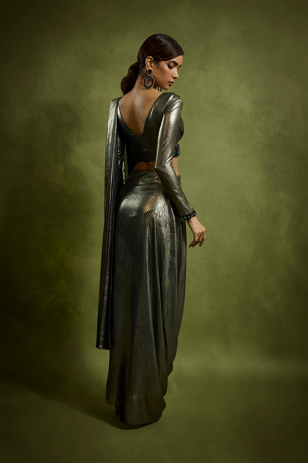 Embossed Drape Saree Teamed with Full Sleeves Blouse