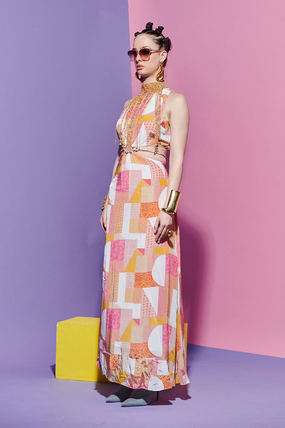 Beaded halter dress in geometric print