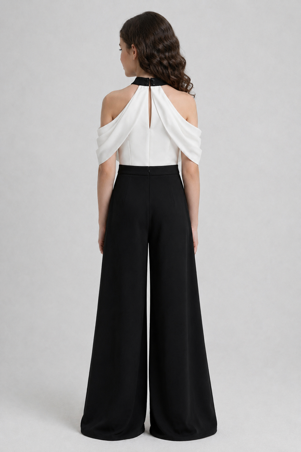 Black N White Jumpsuit Featuring A Draped Neckline N Cold Shoulder