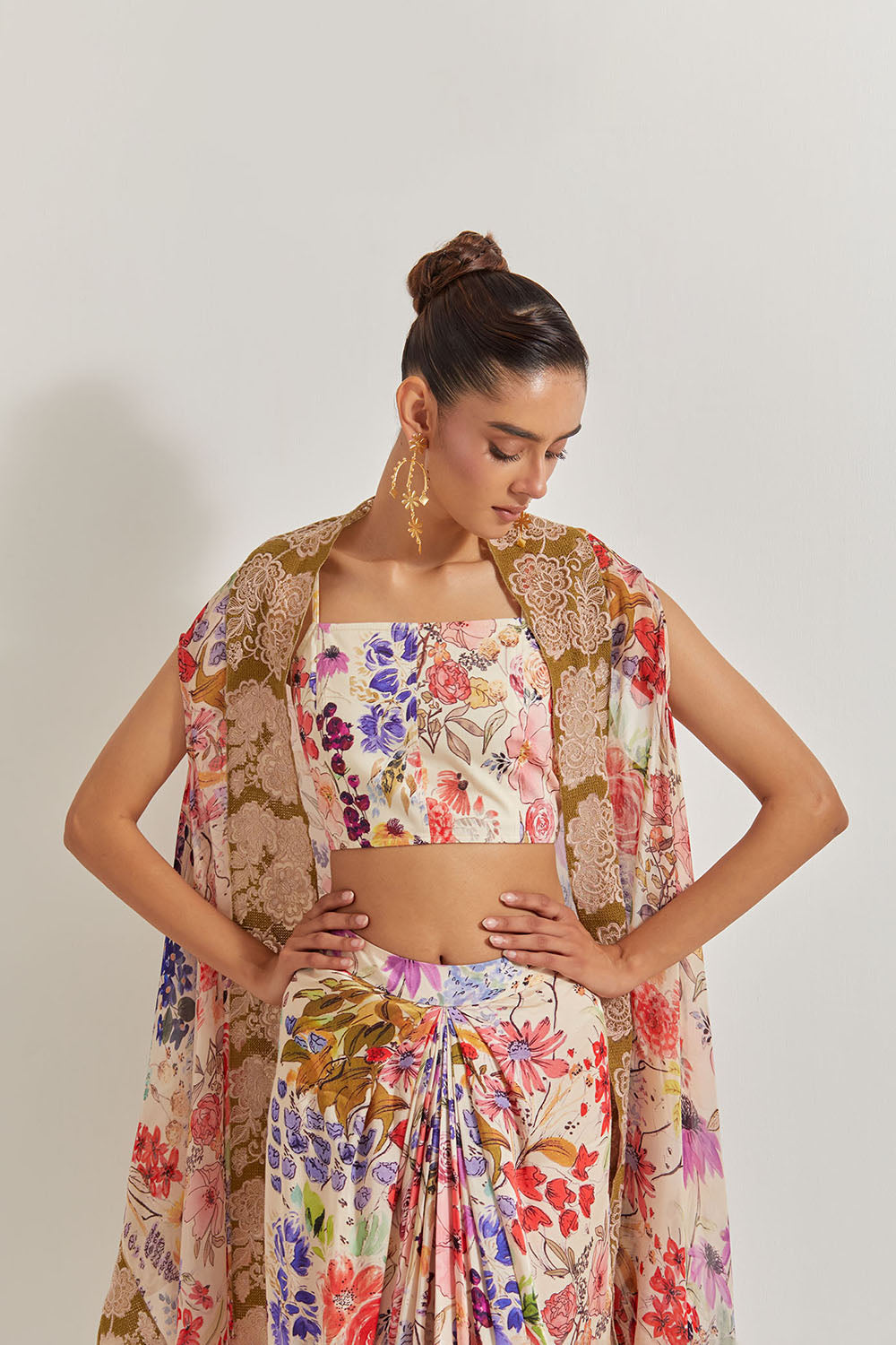Blooming Burst Satin Cowl Skirt Paired With Stretch Bustier And Georgette Cape With Lace Border