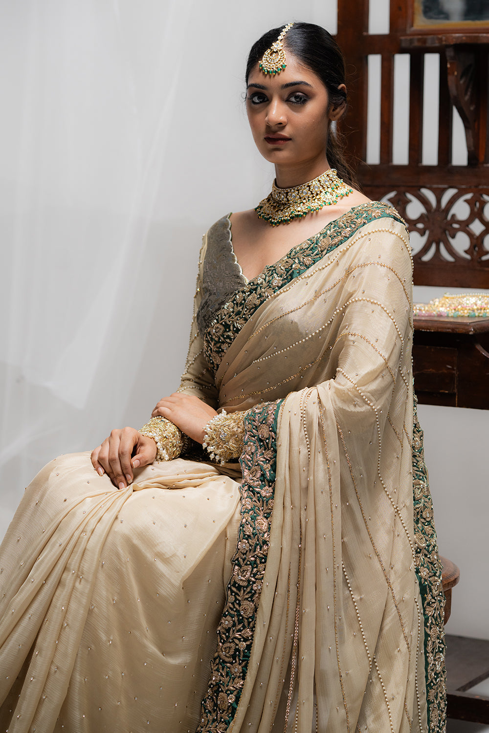 Elegant Beige Embroidered Saree