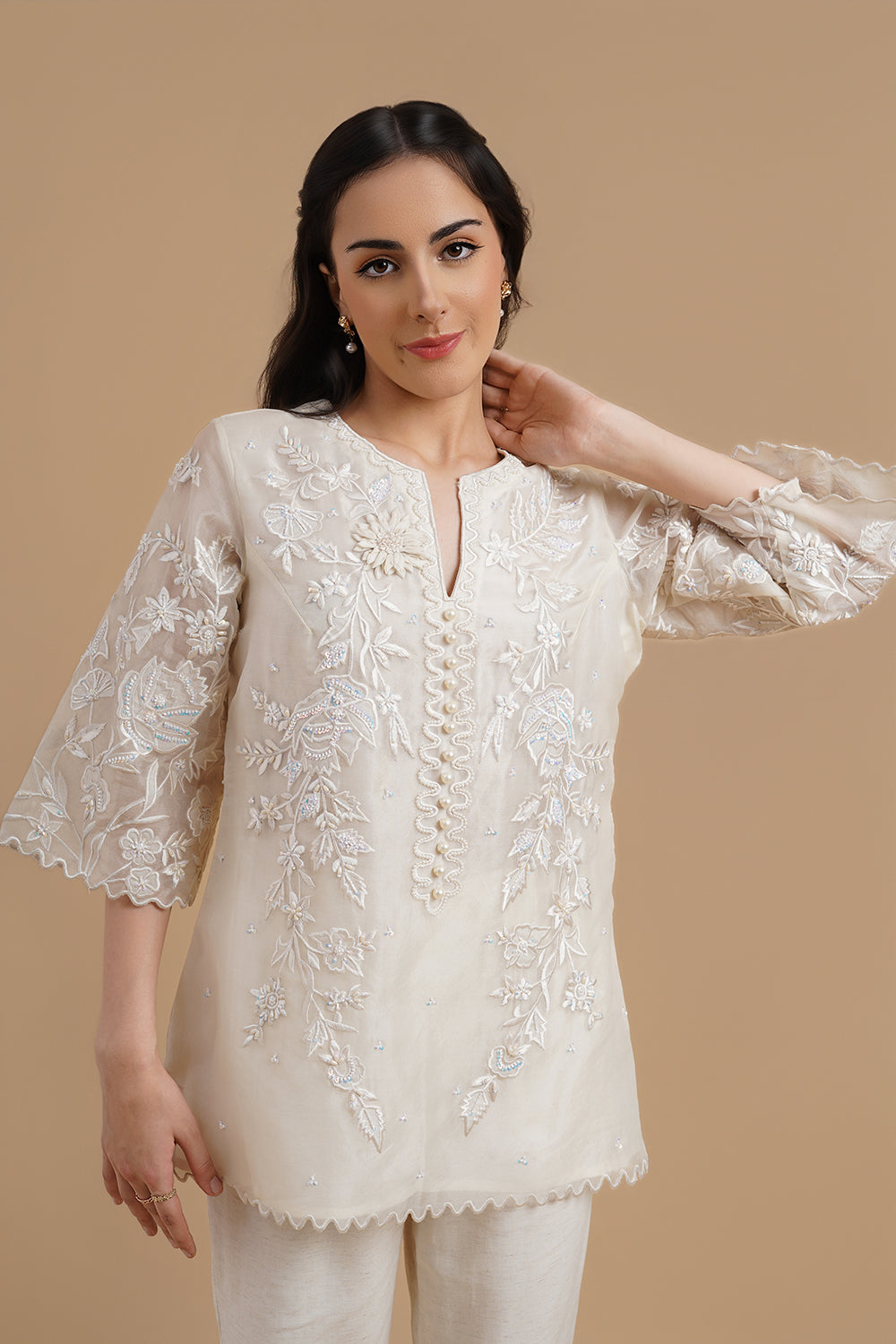 Embroidered Short Kurta Paired With Pants