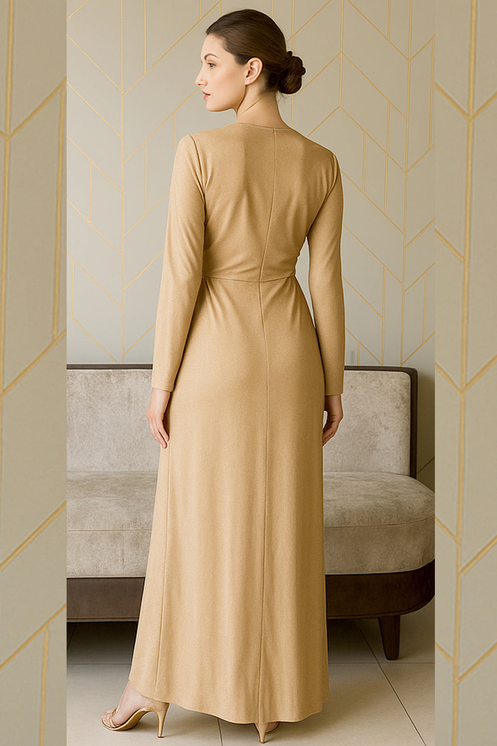 Gold gathered gown with crystals detailing on waist