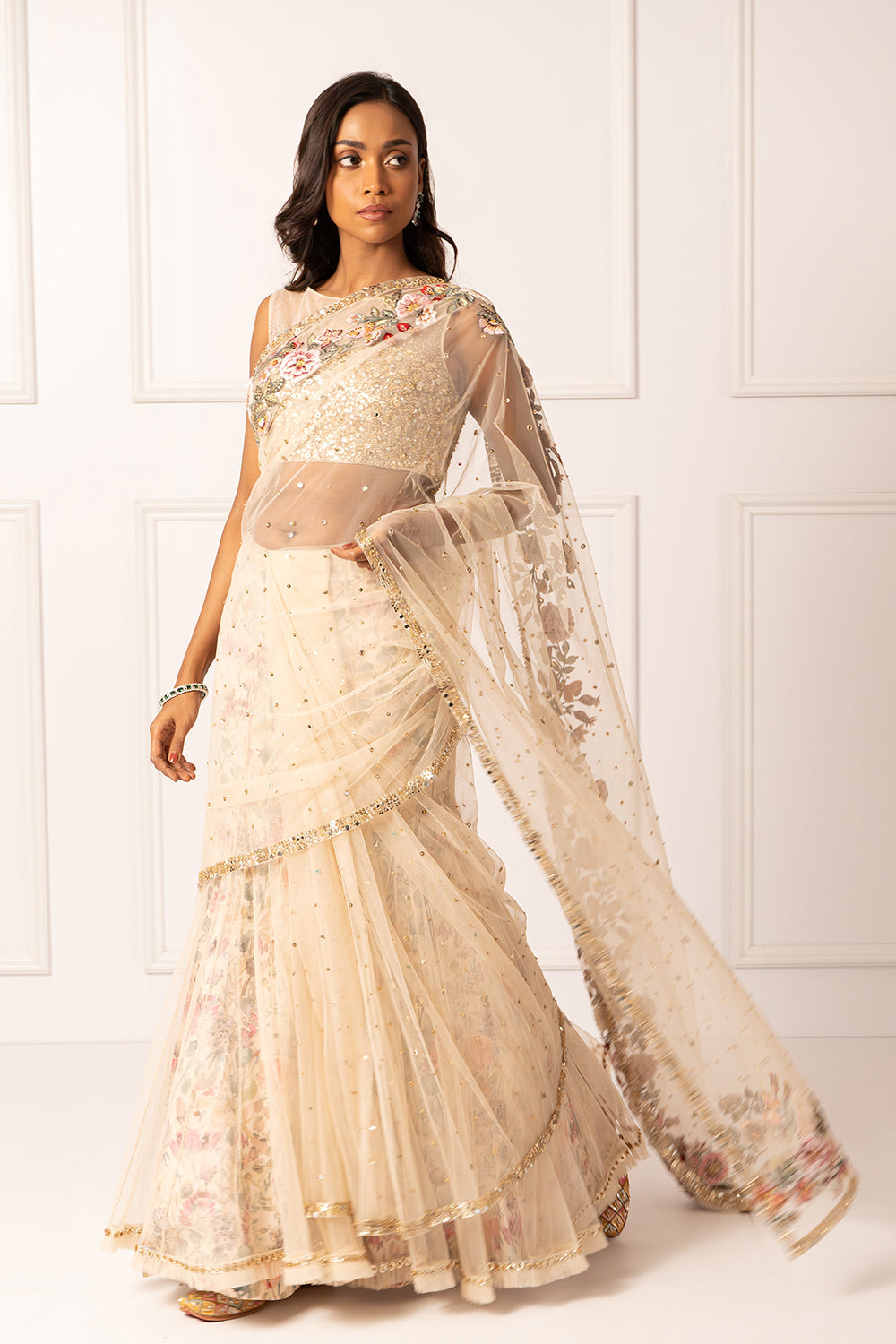 Golden embroidered drape saree set