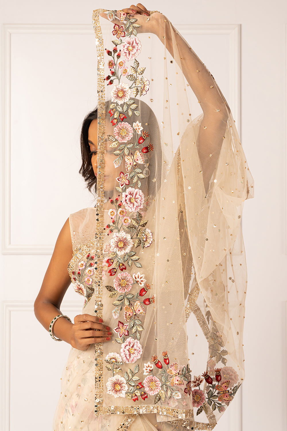 Golden embroidered drape saree set