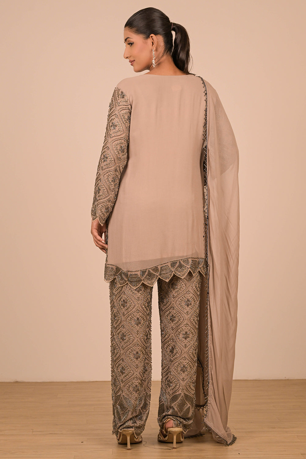 Green Georgette Suit Set with Intricate Moti Embroidery