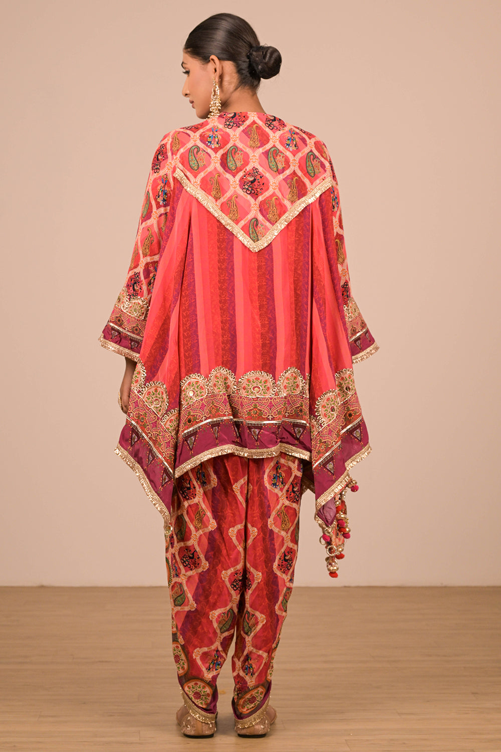 Vibrant Persian Red Crepe Suit Set with Tulip Pants and Heavy Embroidered Potli Bag