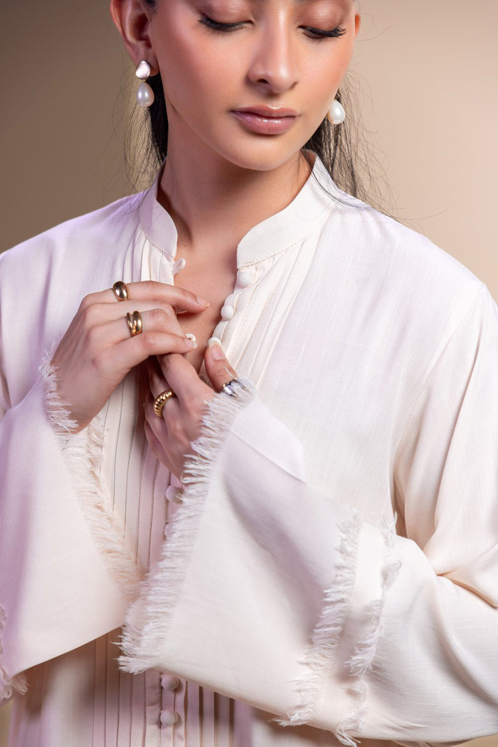 Khushboo & Pankaj Ivory Pintuck Kurta Set