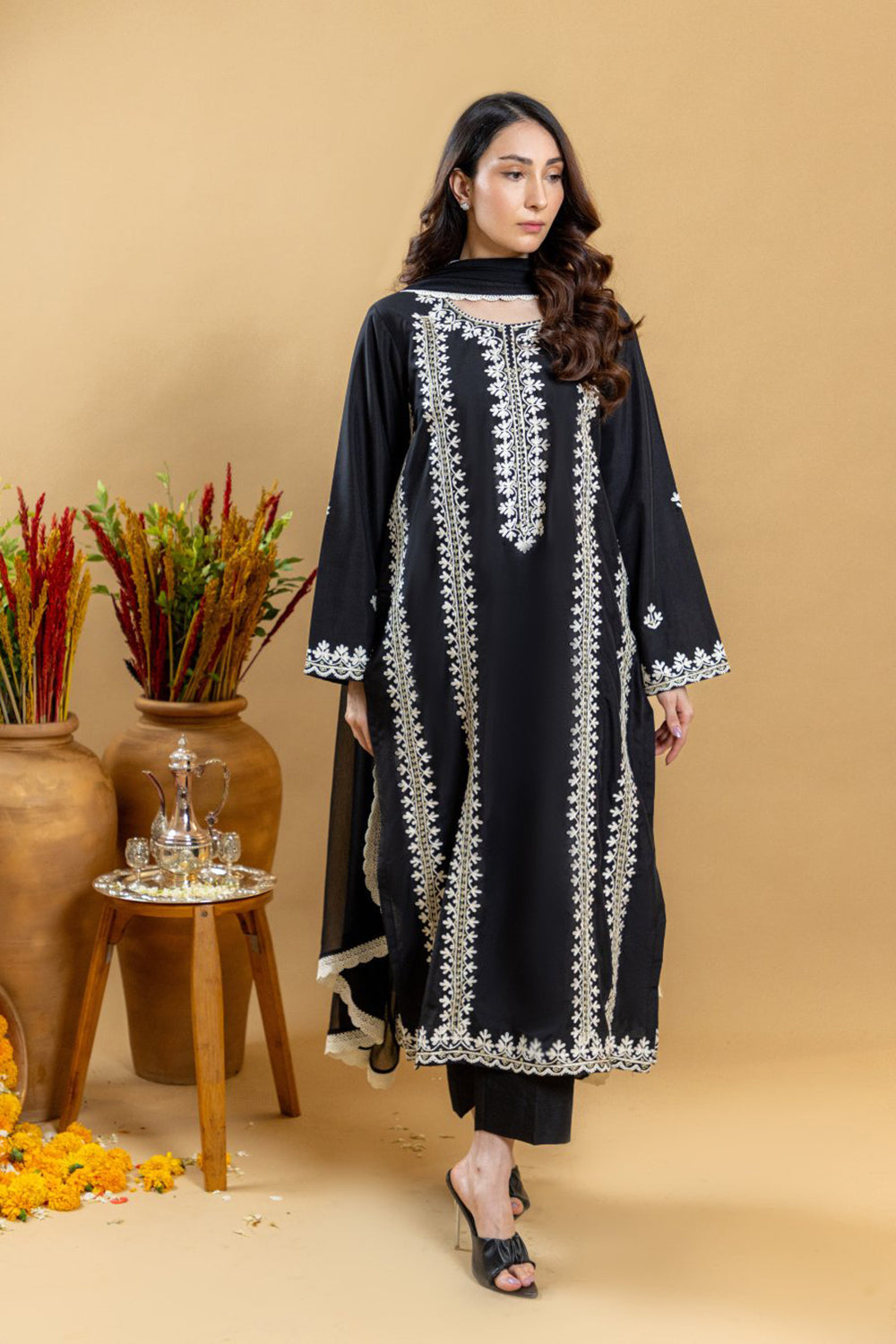 Khushboo & Pankaj Noir Ivory Embroidered Suit Set
