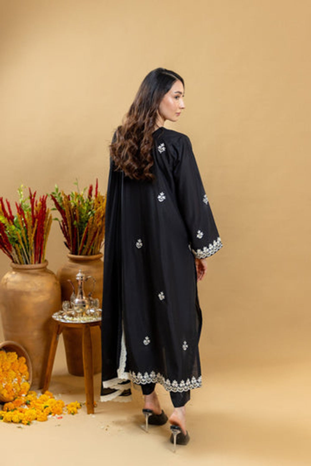 Khushboo & Pankaj Noir Ivory Embroidered Suit Set