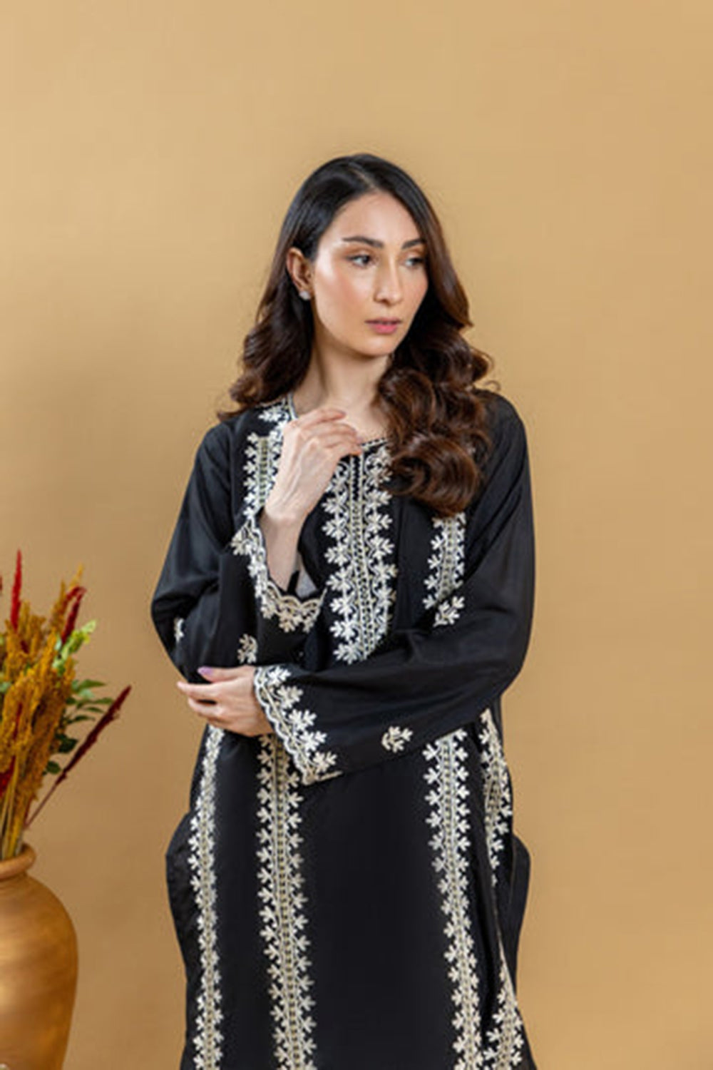Khushboo & Pankaj Noir Ivory Embroidered Suit Set