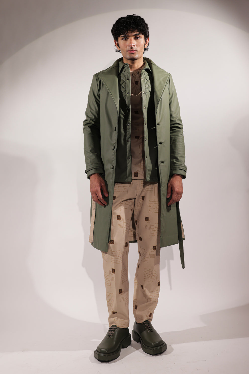Leatherette green trench coat with belt