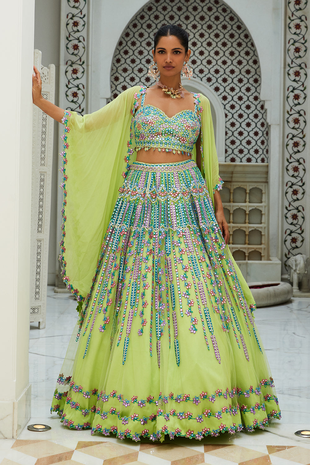 Lime Green Net Lehenga Choli With A Georgette Cape