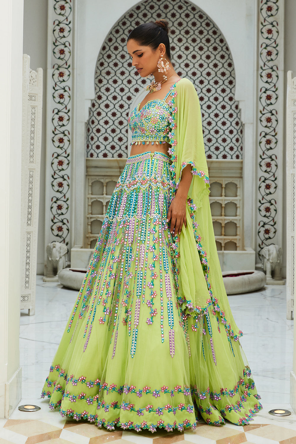 Lime Green Net Lehenga Choli With A Georgette Cape