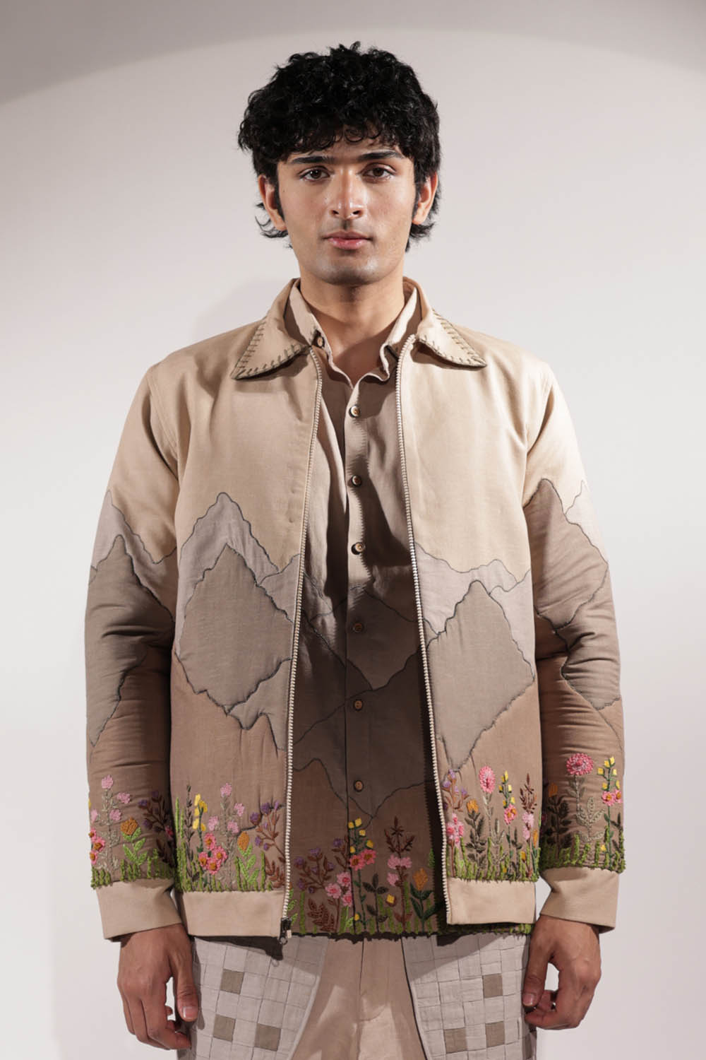 Linen jacket with mountain patchwork and floral embroidery