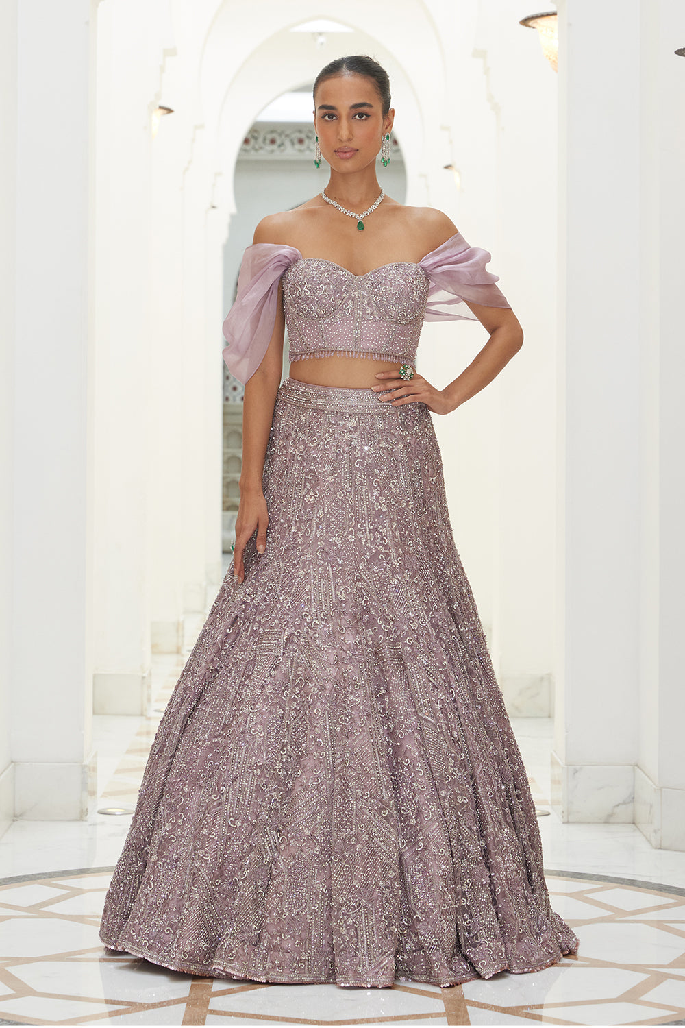 Mauve Net Fistailed Skirt With A Corsetted Blouse