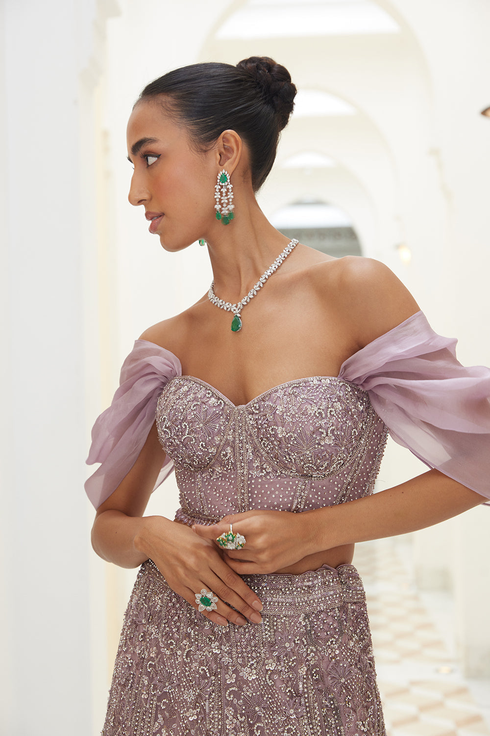 Mauve Net Fistailed Skirt With A Corsetted Blouse