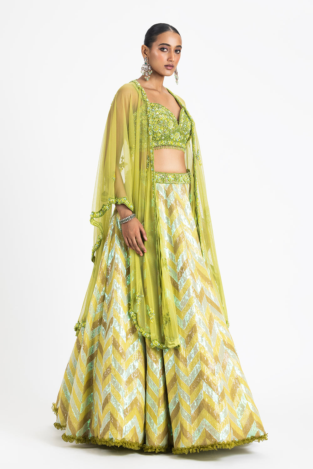 Mehndi Green Sequinned Lehenga With A Bustier And Net Cape