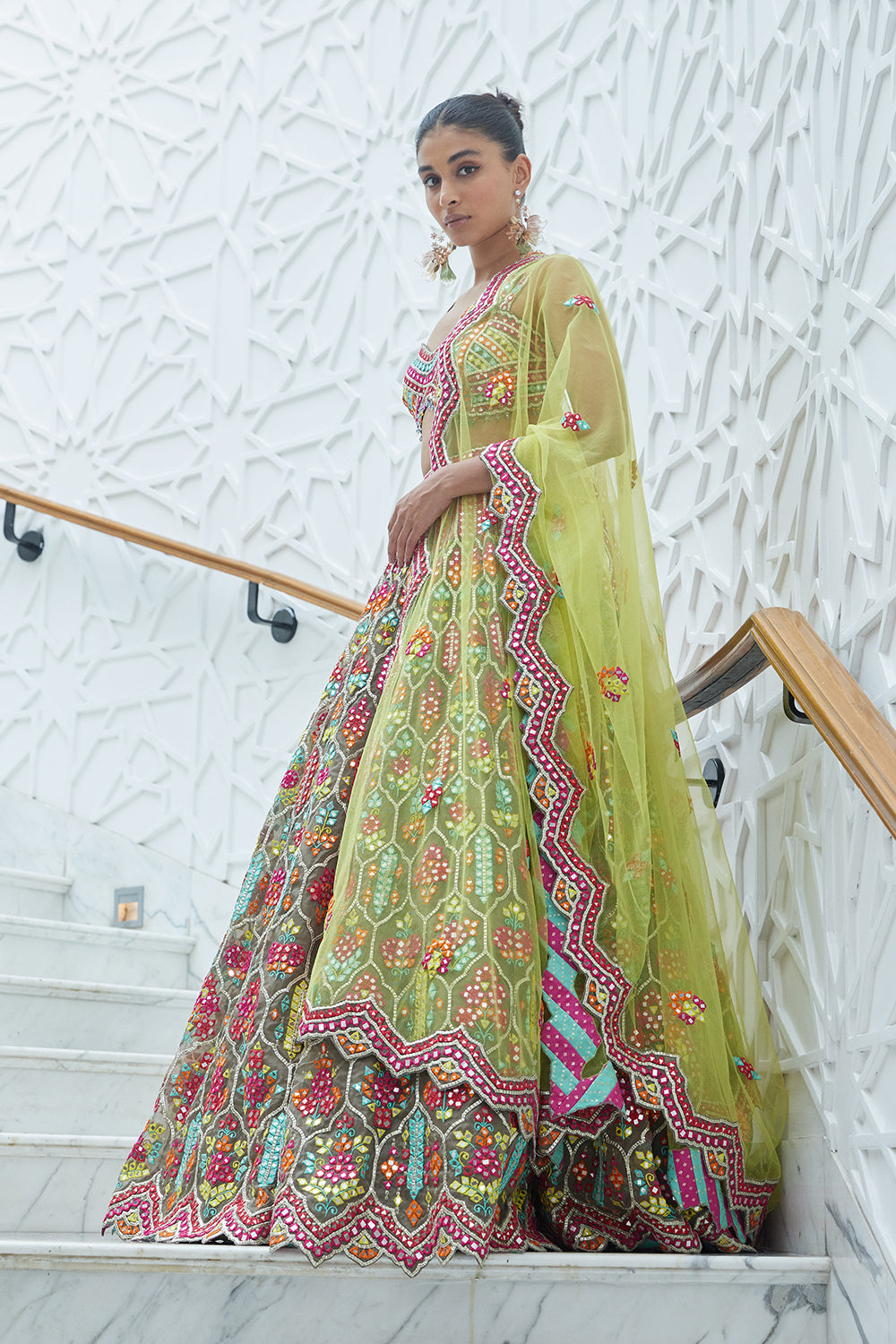 Mocca Organza Lehenga Choli With A Yellow Net Dupatta