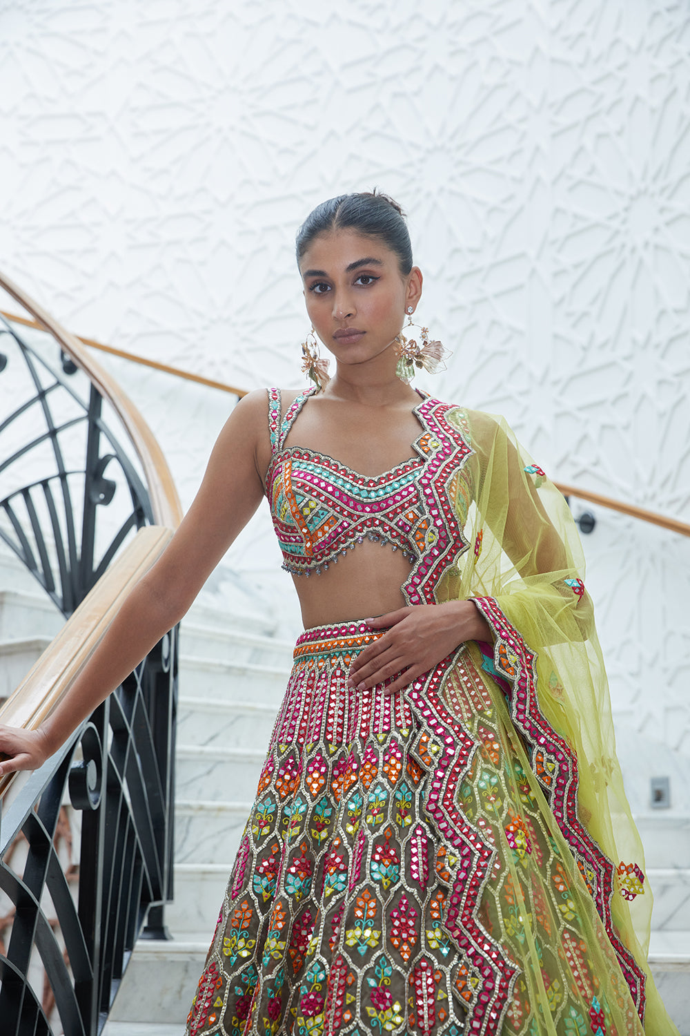 Mocca Organza Lehenga Choli With A Yellow Net Dupatta