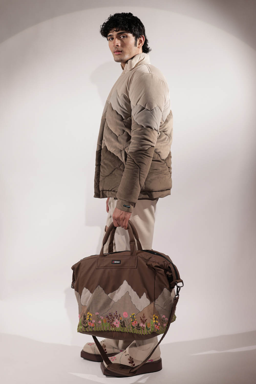 Mountain-inspired quilted puffer jacket