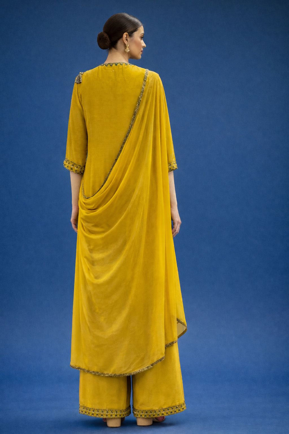 Mustard yellow kurta set with embroidery on neck,hem and sleeves