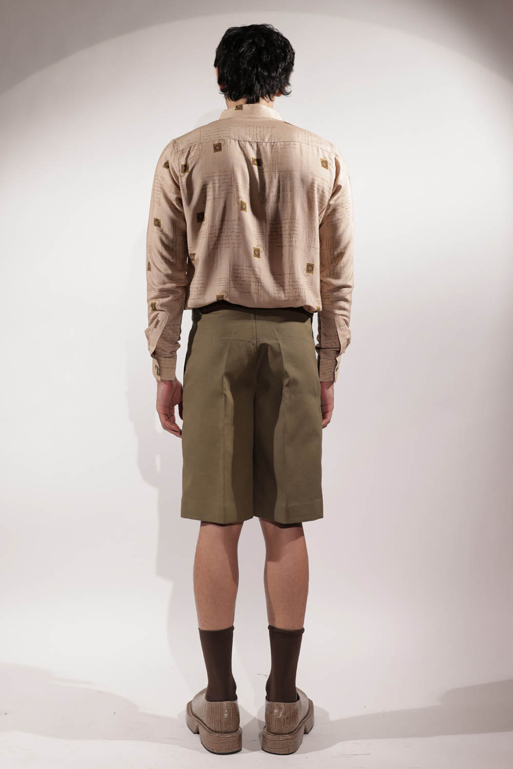 Olive linen shorts with Kantha detailing